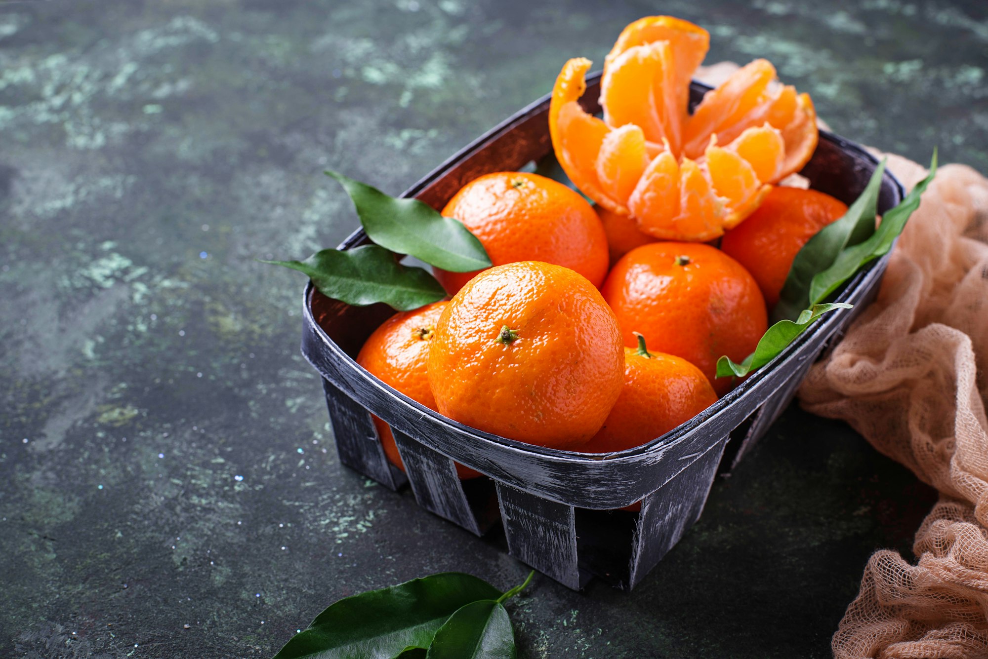 Fresh ripe tangerines with leaves