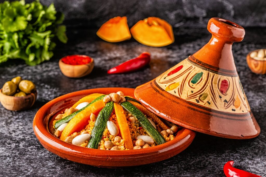 10 Fascinating Facts About Moroccan Food You Need to Know 2 Vegetable tagine with almond and chickpea couscous.